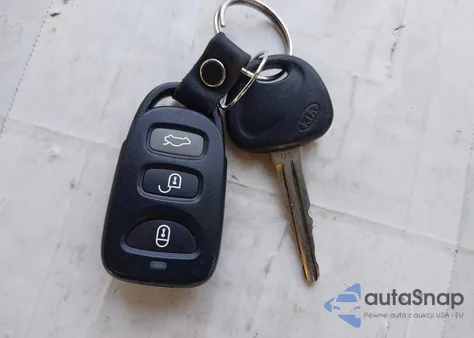 2007 Kia Optima Lx z USA, uszkodzony, nr VIN KNAGE123775112236